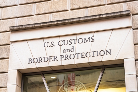 Exterior sign of a U.S. Customs and Border Protection building. | Carlson & Blakeman, LLP